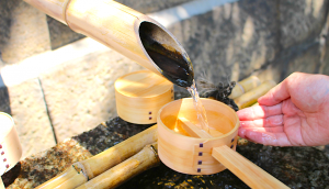 A water spout for cleansing the hands at the entrance to Gokonomiya Shrine